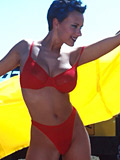Lady Eva with big tits poses naked in the desert on a dirty offroad car - 1