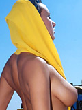 Lady Eva with big tits poses naked in the desert on a dirty offroad car - 6