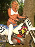 Naked biker MILF with pierced clitoris and nice tits rides a motorbike - 2