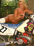 Naked biker MILF with pierced clitoris and nice tits rides a motorbike - 7