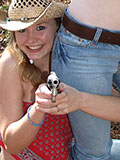 Shooting sport with topless teen cowgirls Kitty and Leonie who show their tits - 6