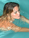 Teen girl in pink bikini swims topless in the pool - 14