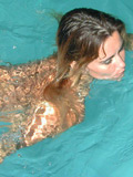 Teen girl in pink bikini swims topless in the pool - 15